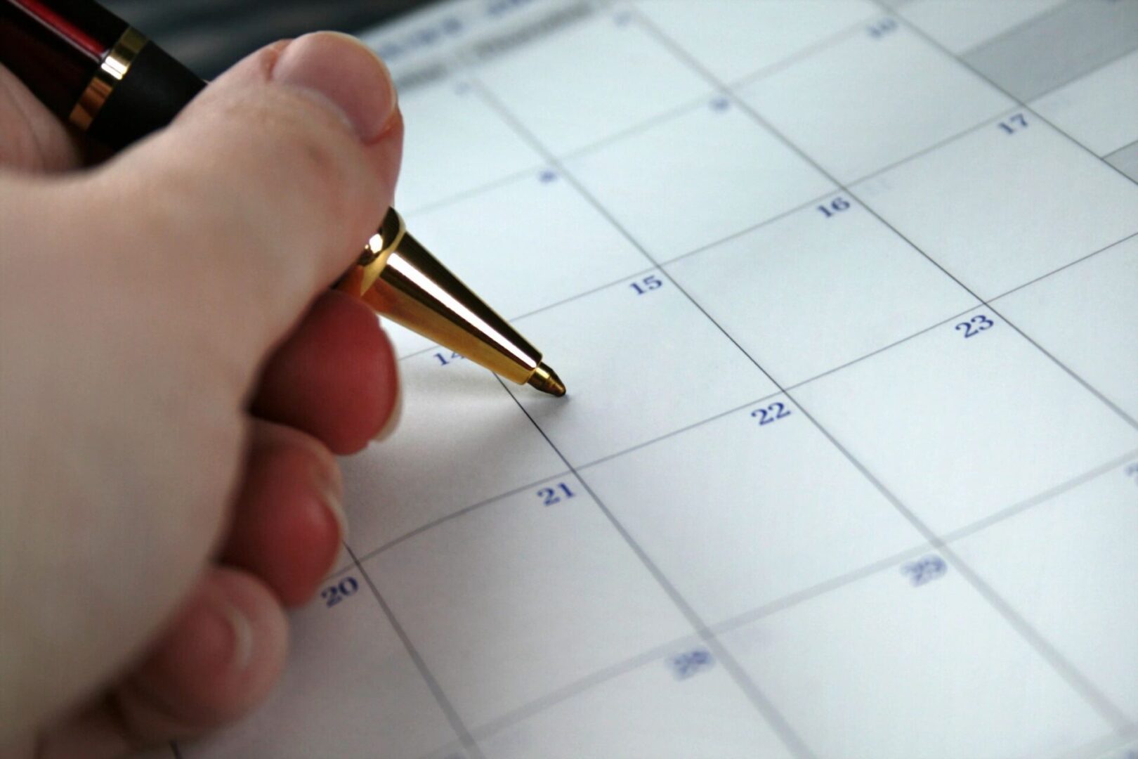 calendar with pen on the 15 for the first day of open enrollment or a special enrollment period